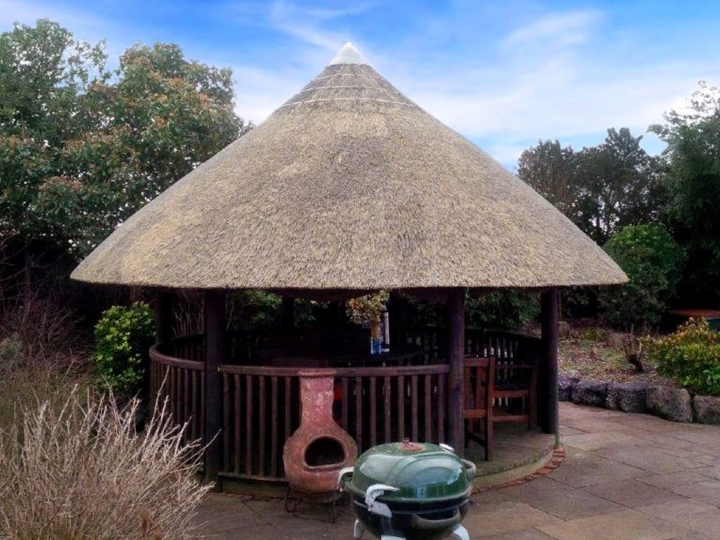 Gazebo with a thatched roof